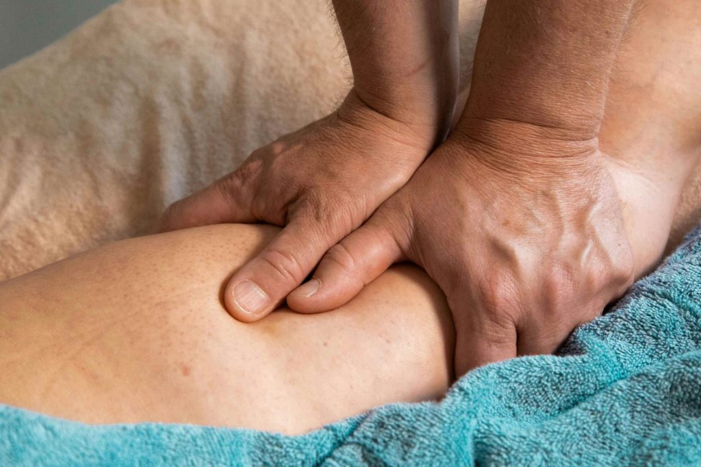 Person receiving leg massage